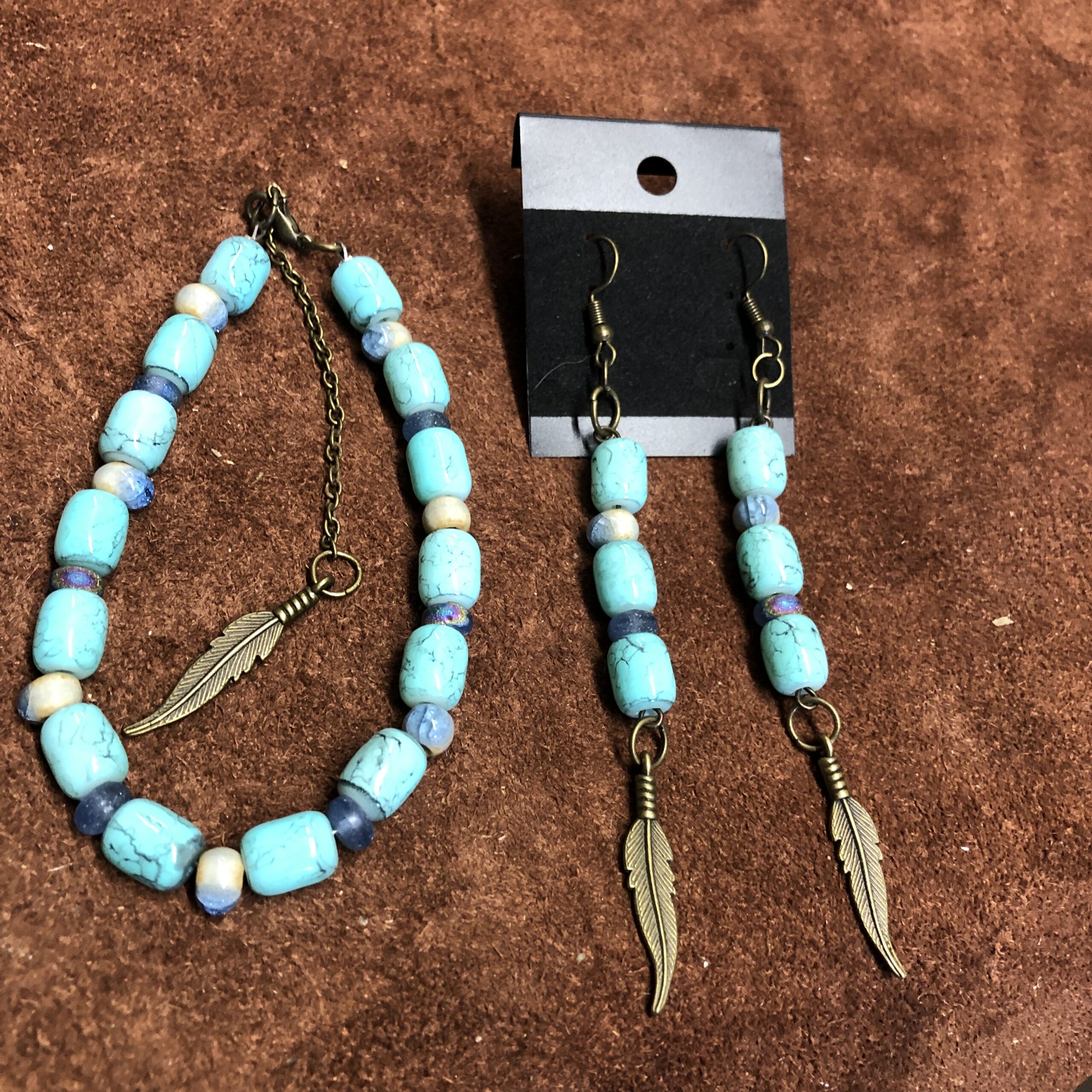 Barrel Shaped Turquoise with Antique Brass Feather Charms Bracelet and Earrings