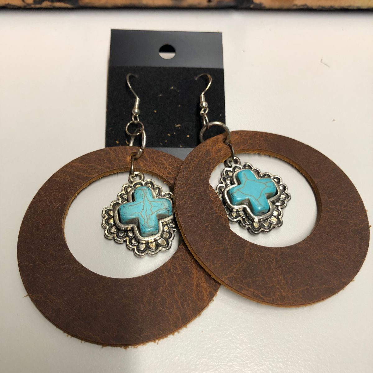 Distressed Leather Wide Circle Cutout Earrings with Faux Turquoise & Silver Cross Charms on Silver Ear Wires