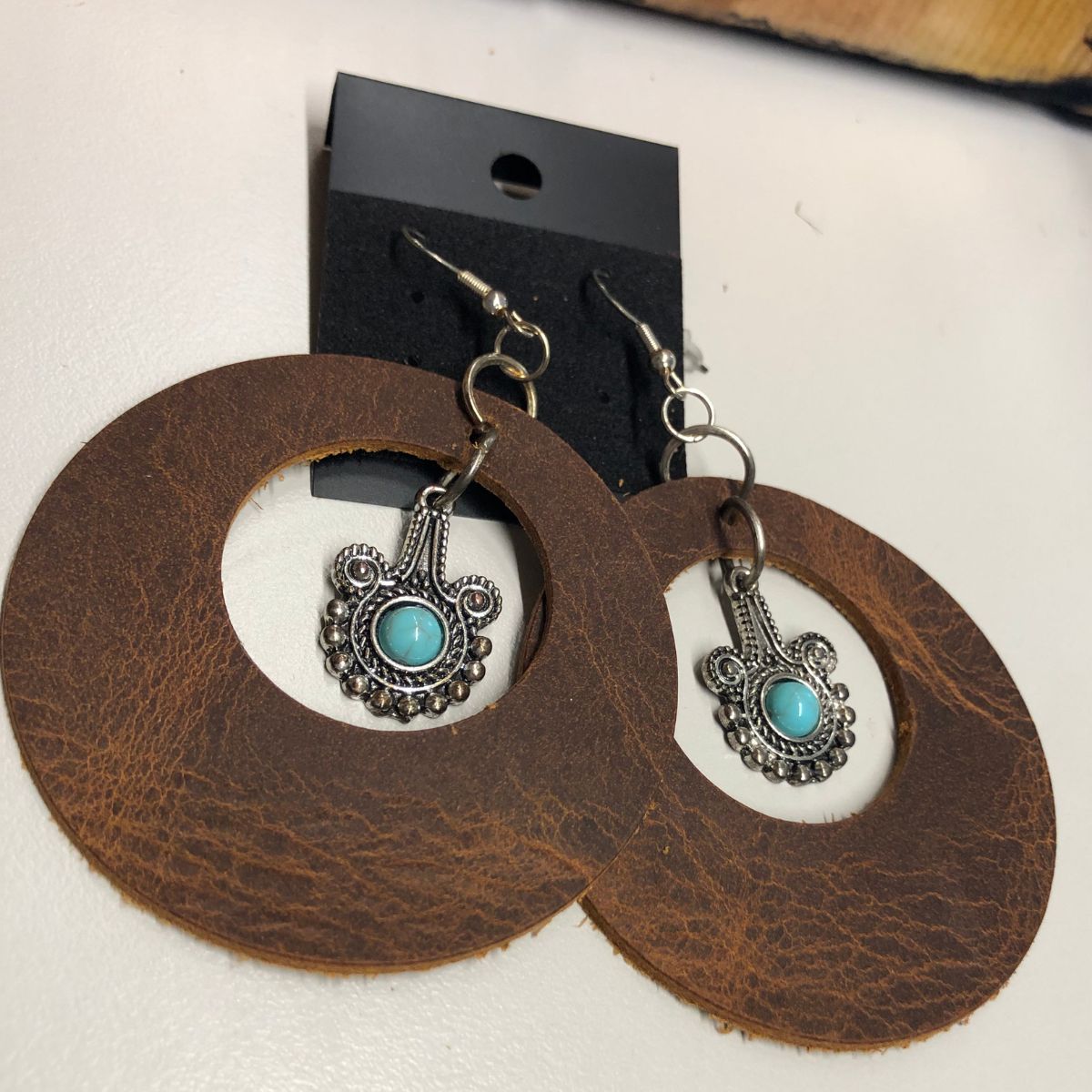 Distressed Leather Wide Circle Cutout Earrings with Faux Turquoise & Silver Sitar Charms on Silver Ear Wires