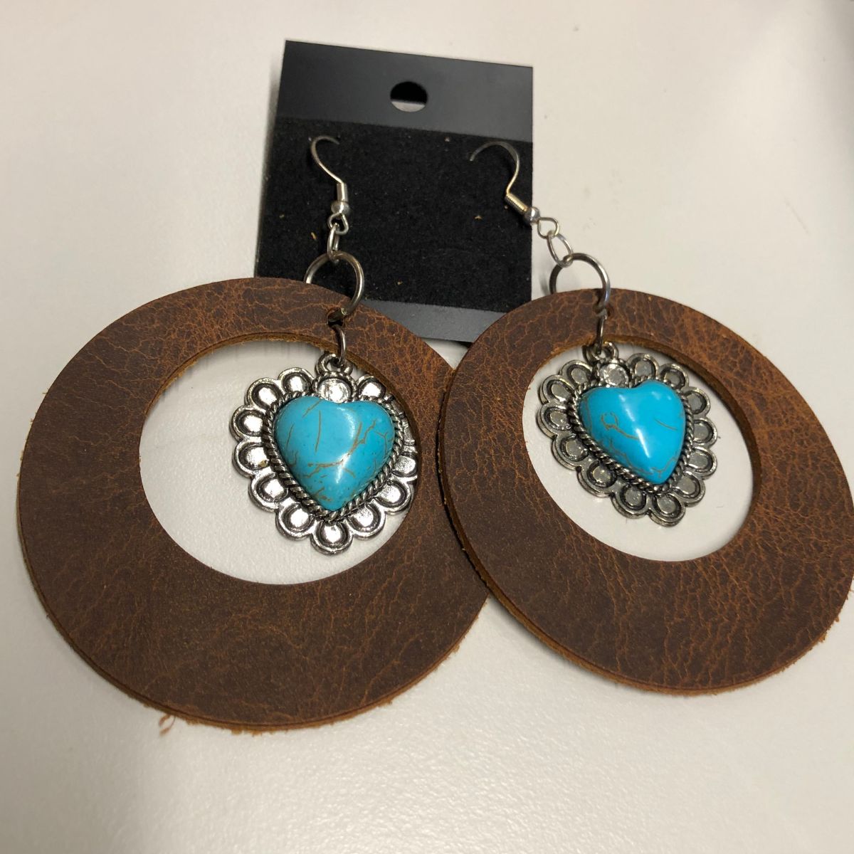 Distressed Leather Wide Circle Cutout Earrings with Faux Turquoise & Silver Heart Charms on Silver Ear Wires
