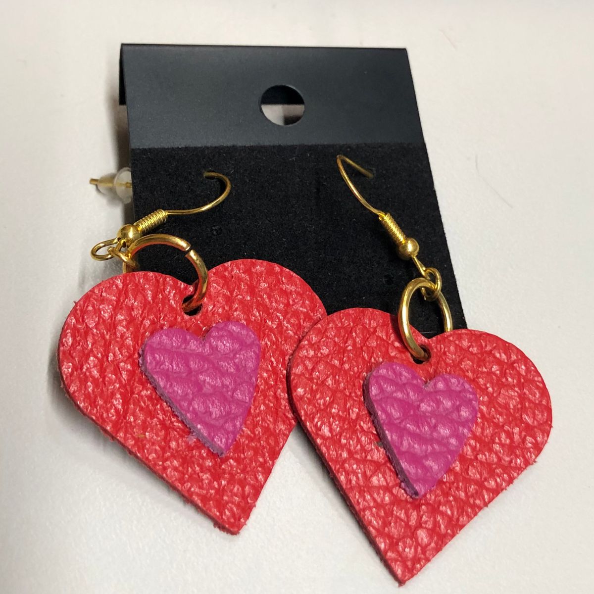 Real Red and Pink Pebbled Leather Heart Earrings on Gold ear wires
