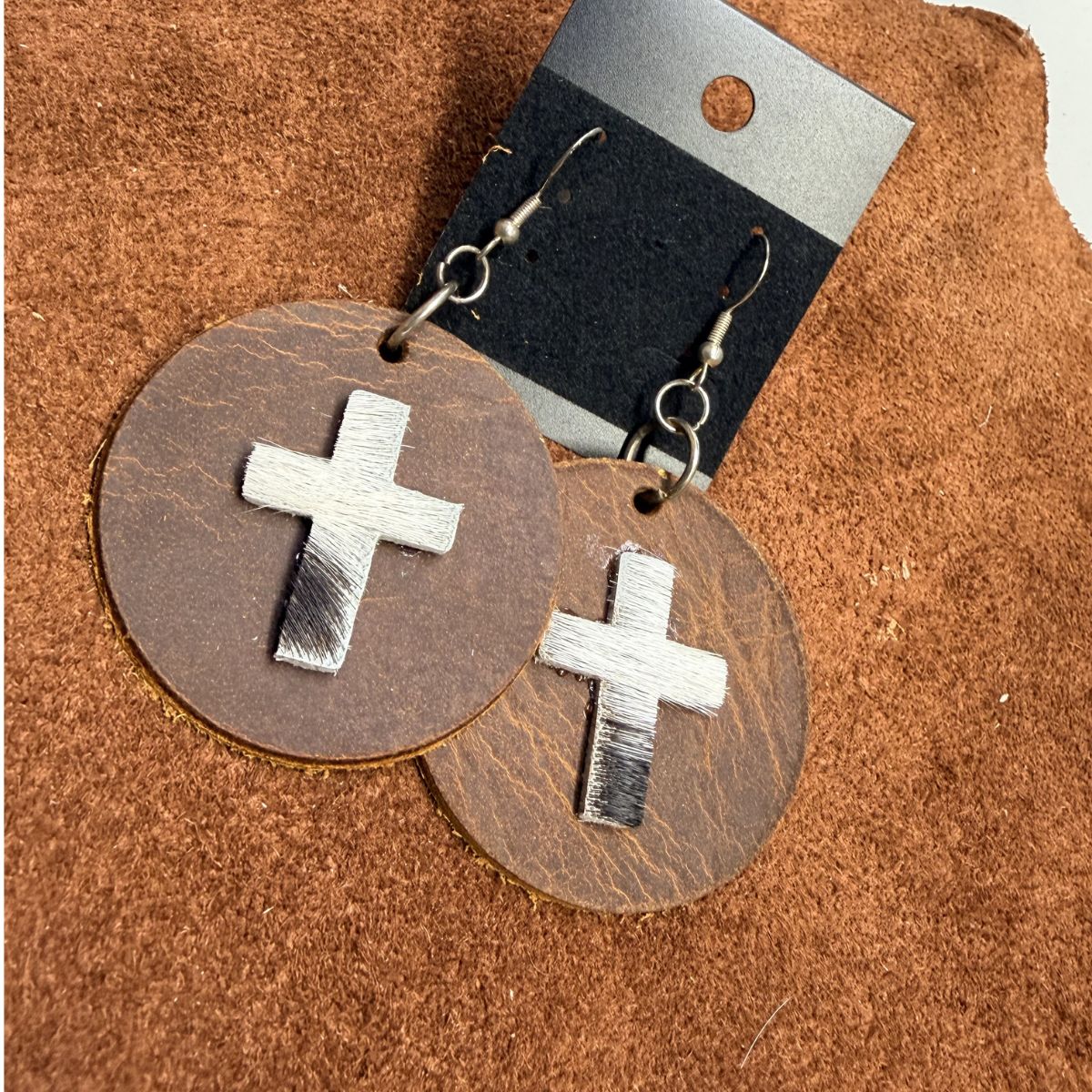 Real Distressed Leather 2 Inch Circles with Black and White Hair on Hide Crosses on Silver Ear Wires
