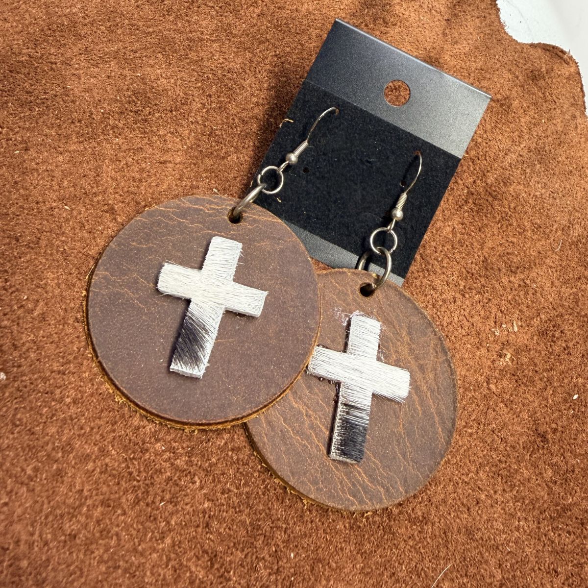 Real Distressed Leather 1.5 Inch Circles with Black and White Hair on Hide Crosses on Silver Ear Wires