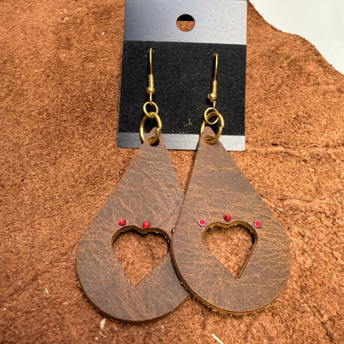 Distressed Leather Teardrop Earrings with Heart Cutouts and Red Rhinestones on Gold Ear Wires