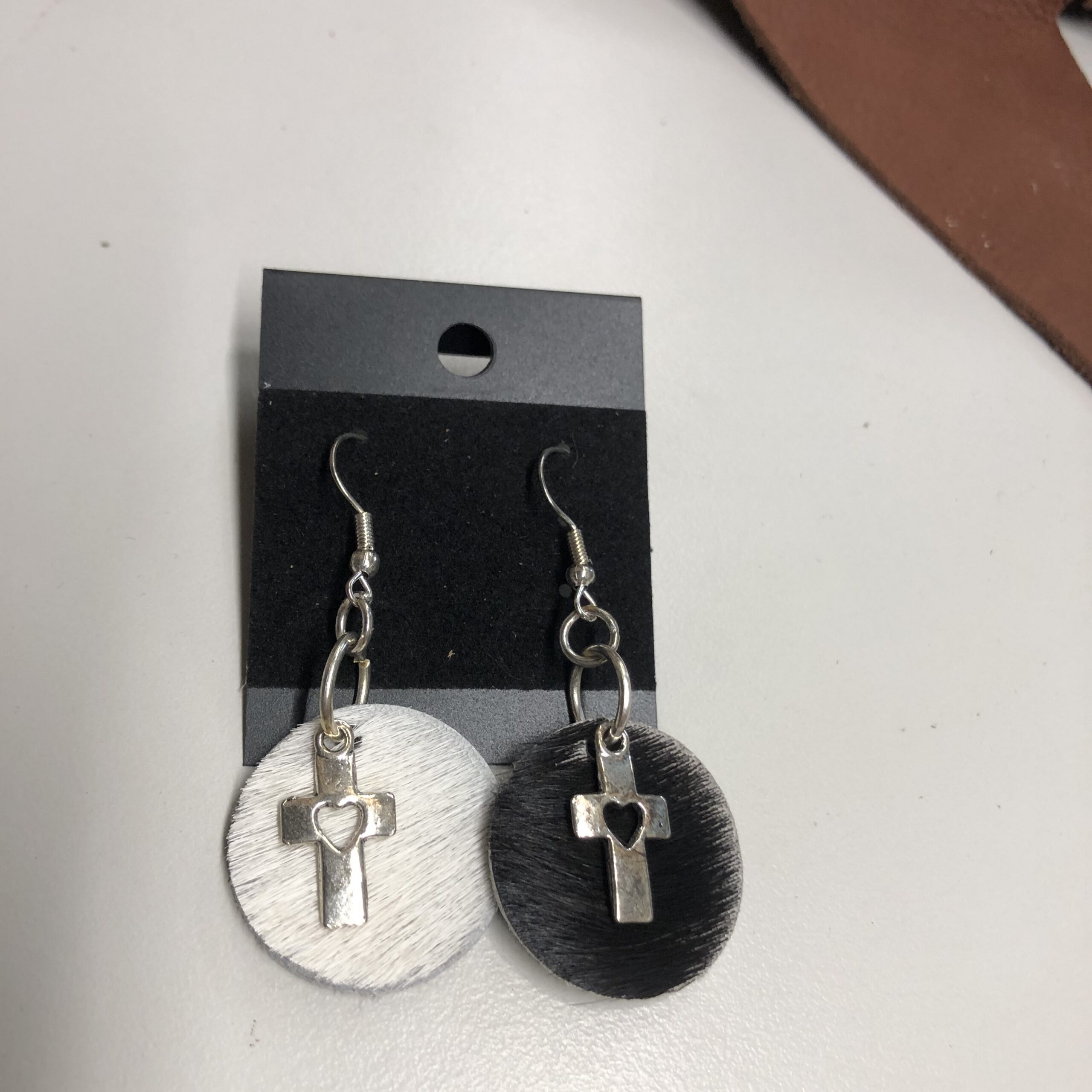 Real Hair on Hide Black & White 1inch Round Earrings with Silver Heart Cutout Cross Charm on Silver Ear Wires