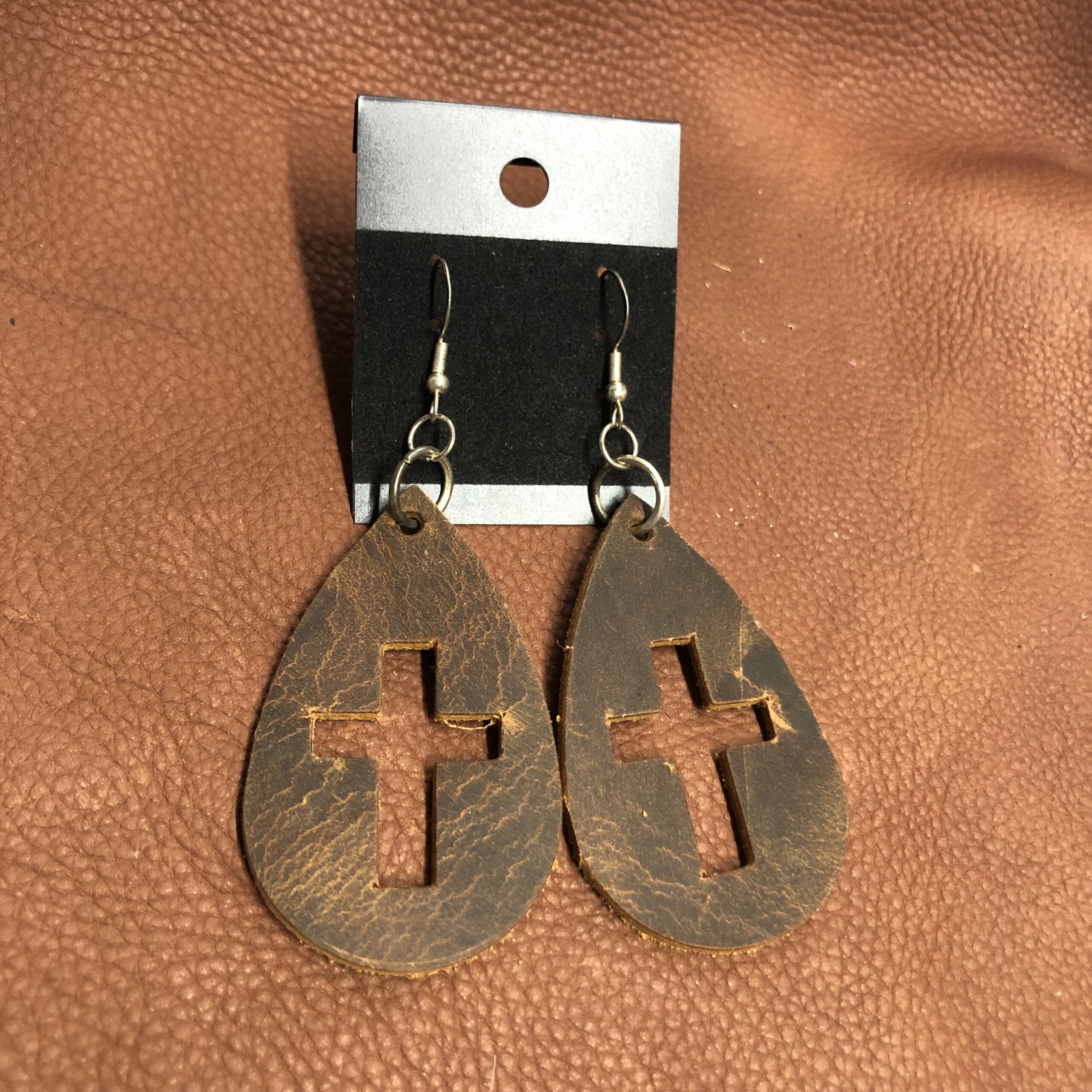 Real Distressed Leather Cross Cutout Teardrop Earrings on Silver Ear Wires
