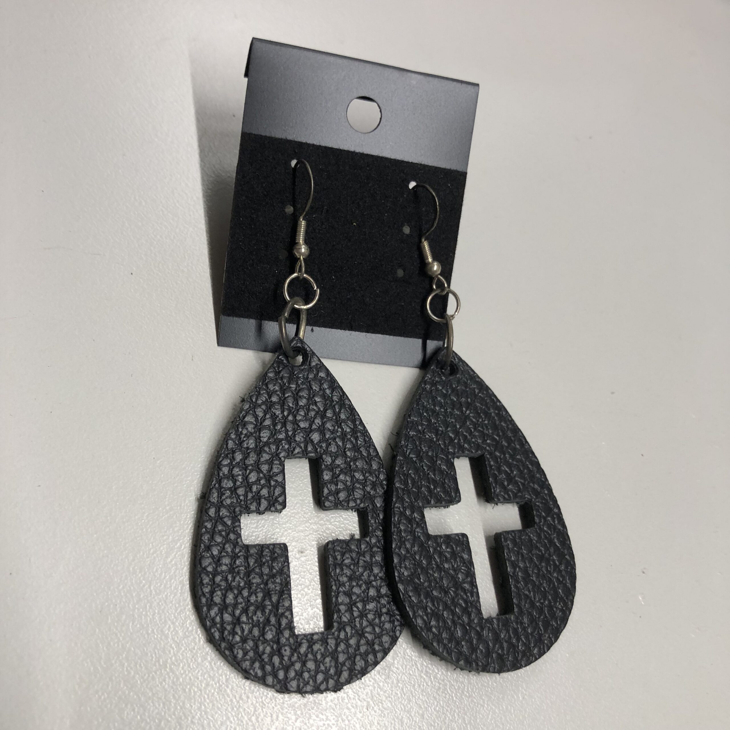 Real Black Pebbled Leather Cross Cutout Teardrop Earrings on Silver Ear Wires