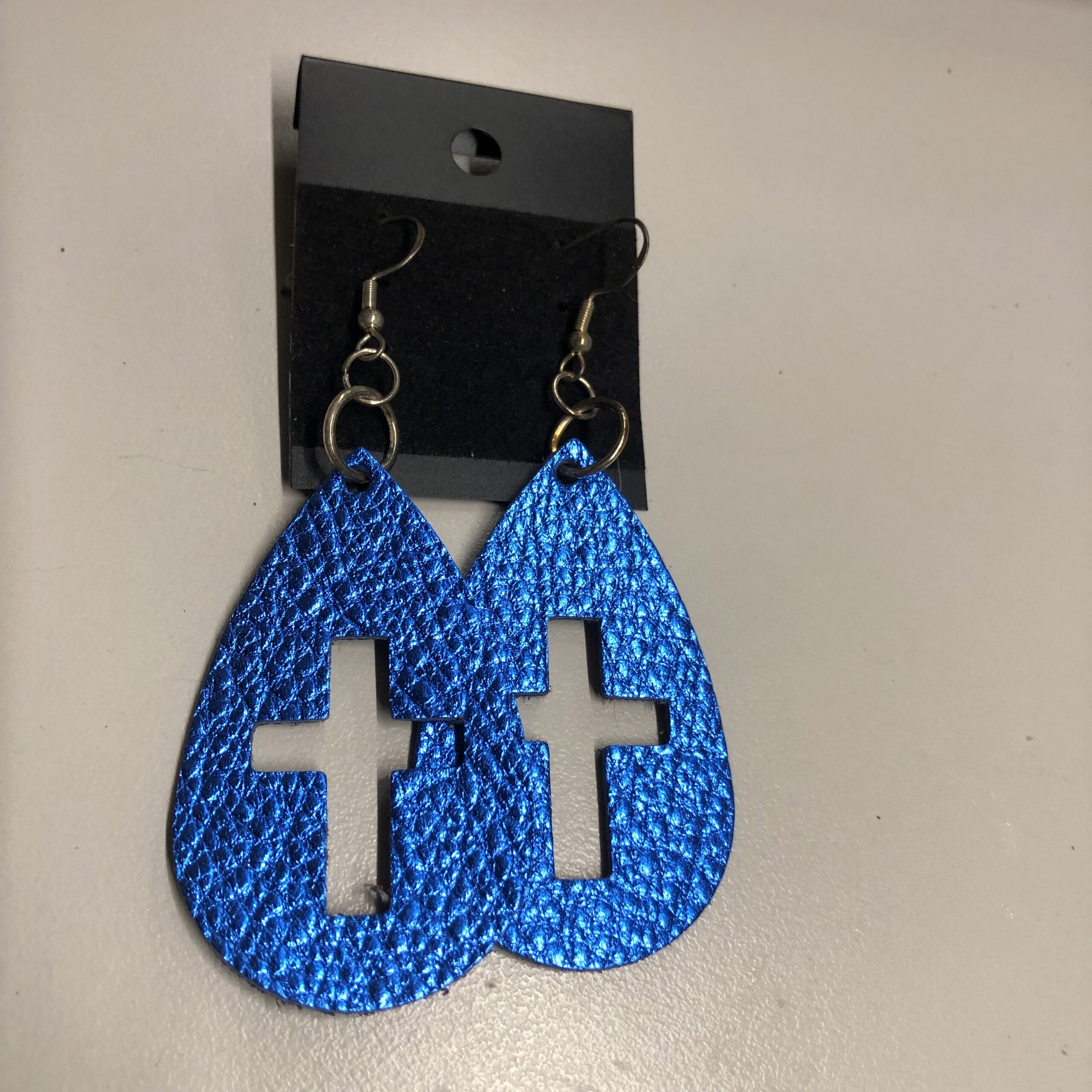 Real Blue Leather Cross Cutout Teardrop Earrings on Silver Ear Wires