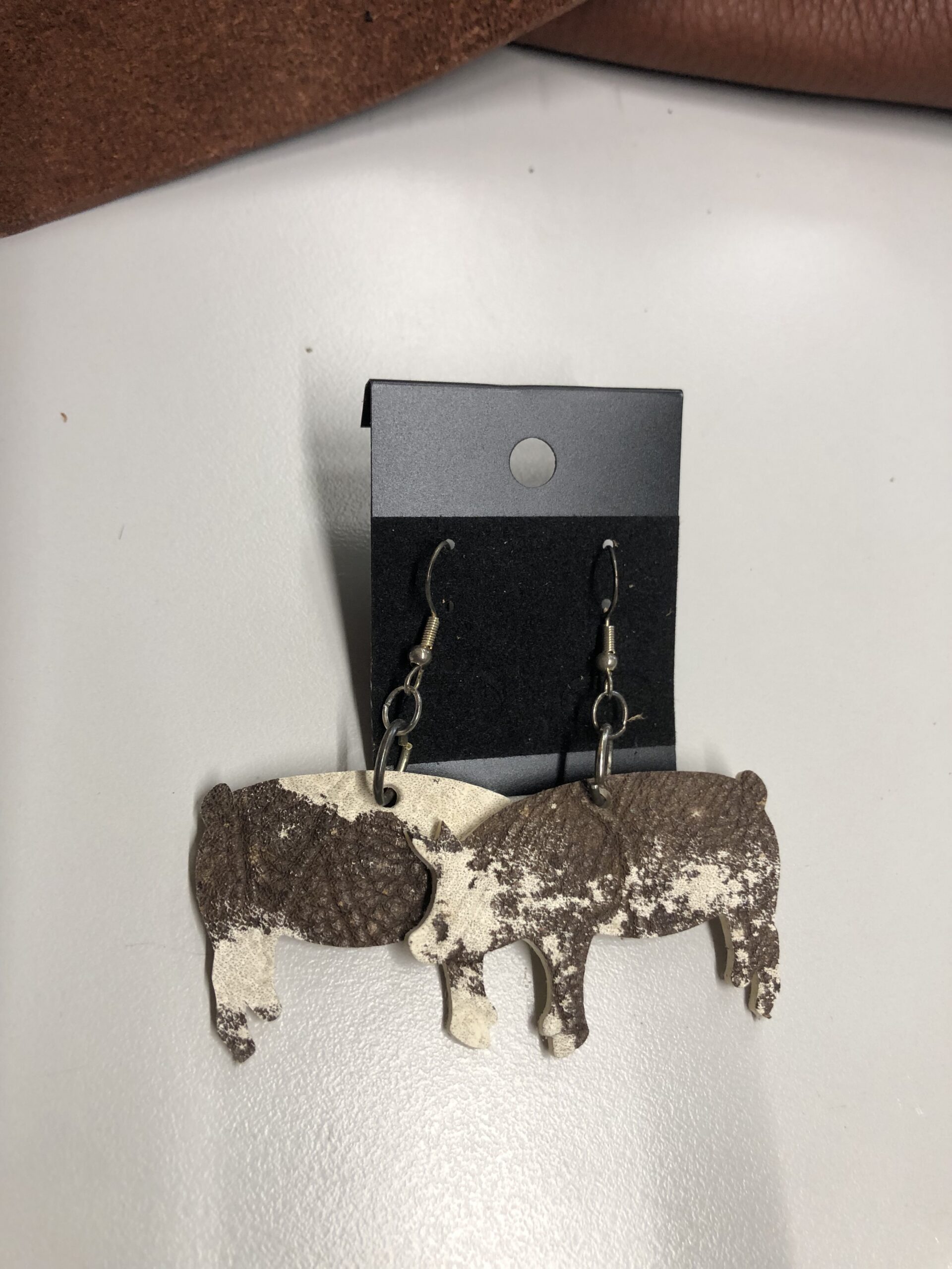Real Brown & White Pig Cutout Earrings on Silver Ear Wires